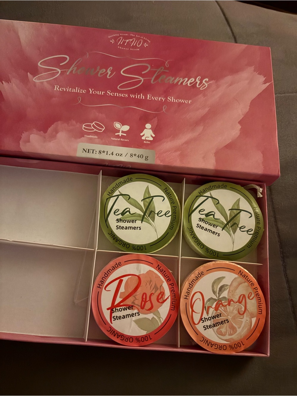 Shower steamers, 4 left, 2 tea tree, one orange, and one rose